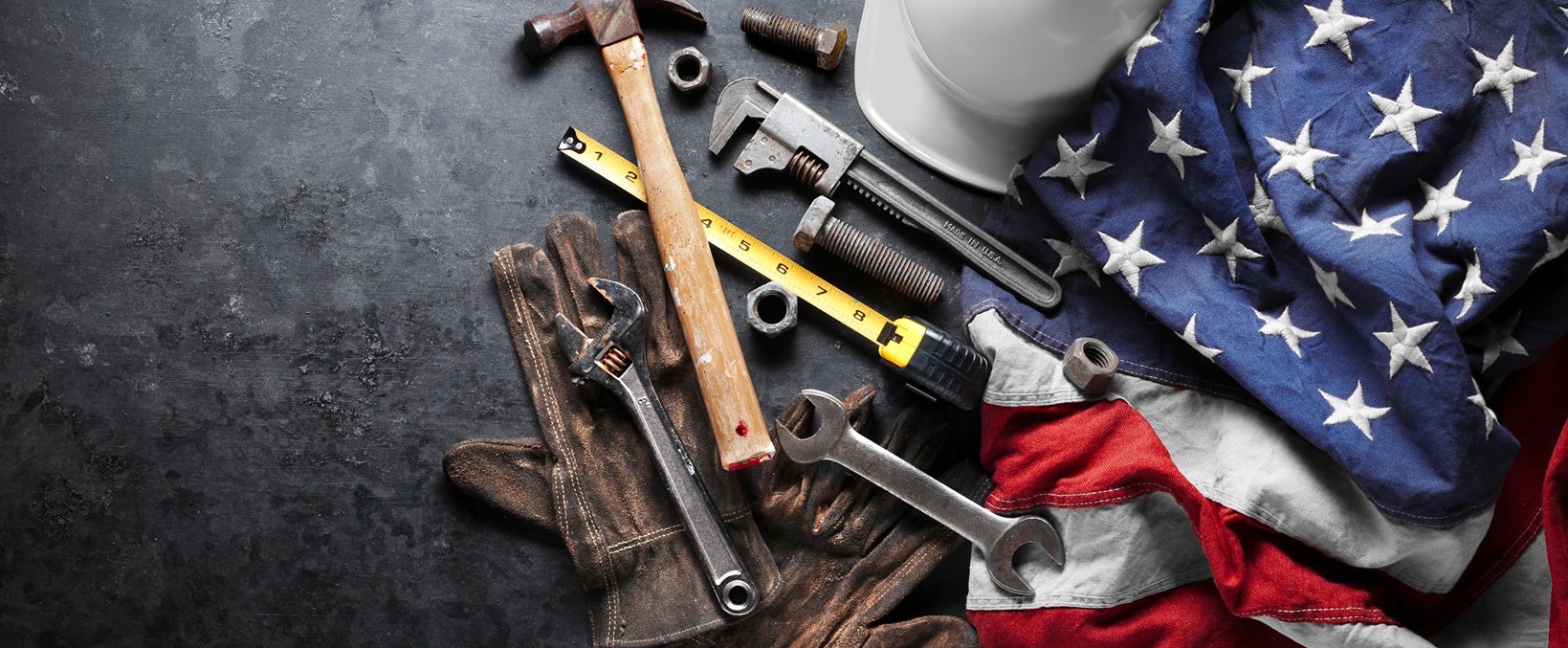 American Flag with tools and a hard hat in celebration of labor day  | SmartStop