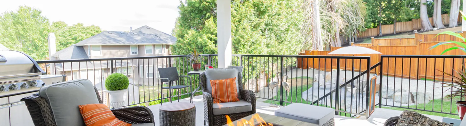 furnished patio with comfortable arm chairs, a couch, a grill, and a fire pit