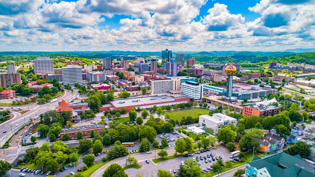 Image of downtown knoxville with the smokey mountains in background | SmartStop