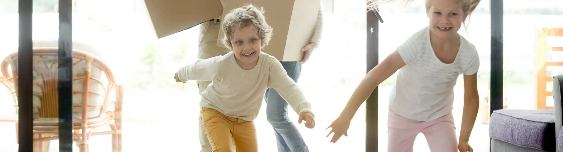 Image of baby clothes displayed on floor to look like a bunny