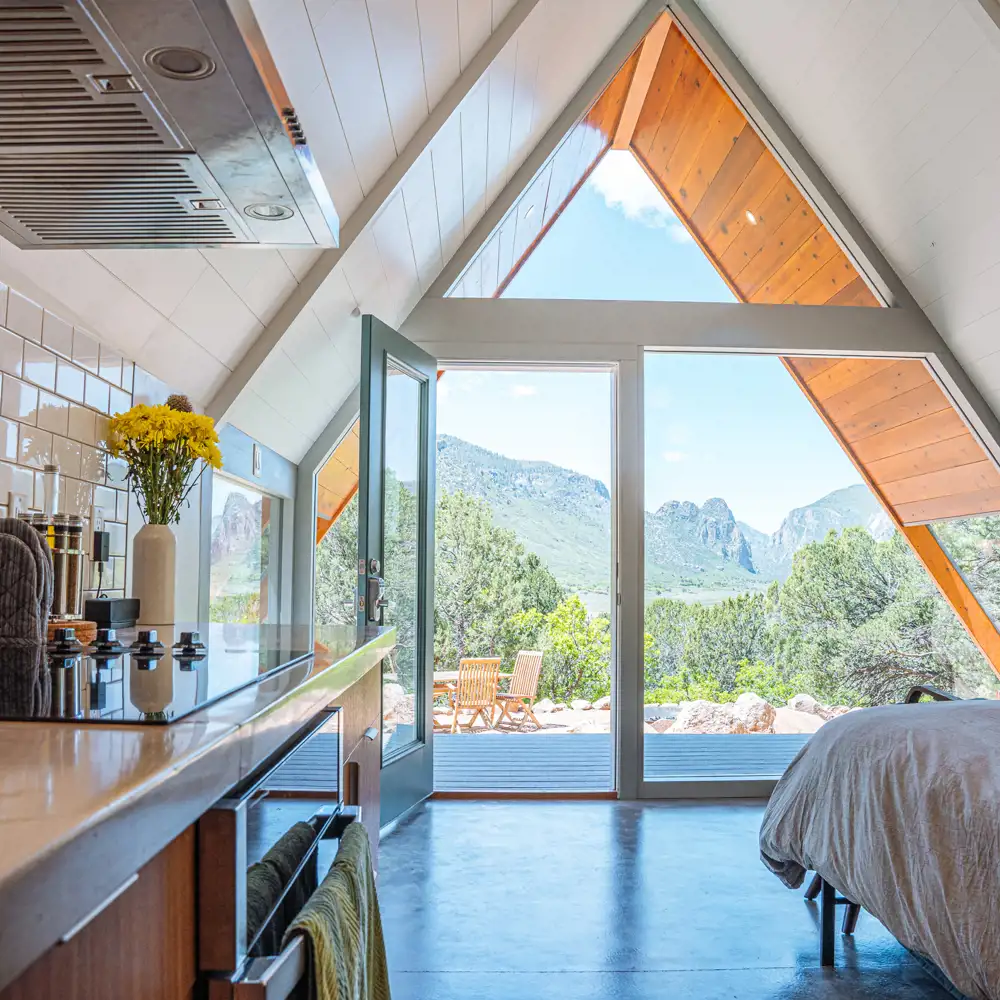 airbnb in tiny home in colorado with view of mountains and trees