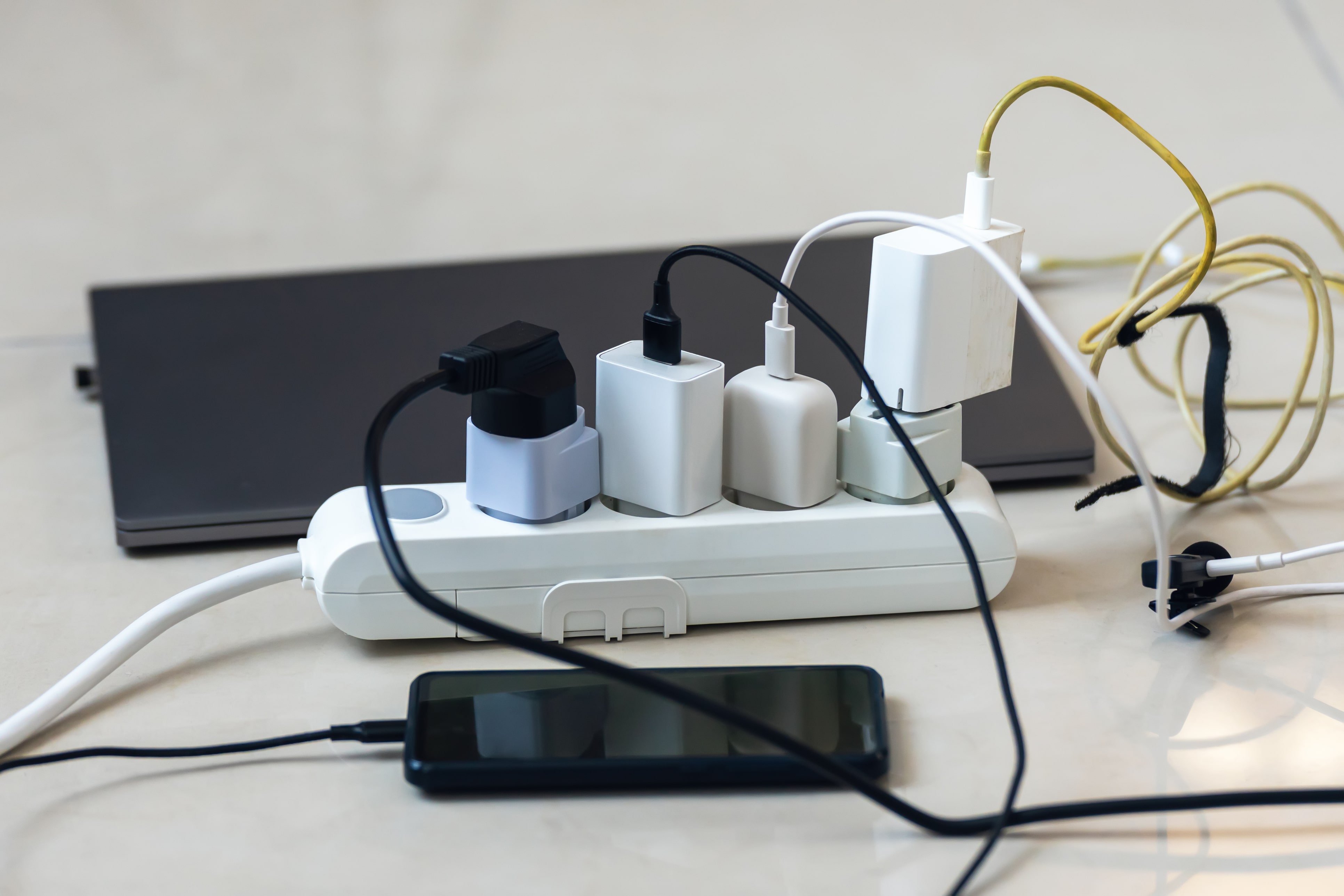 power strip with charging cords plugged in