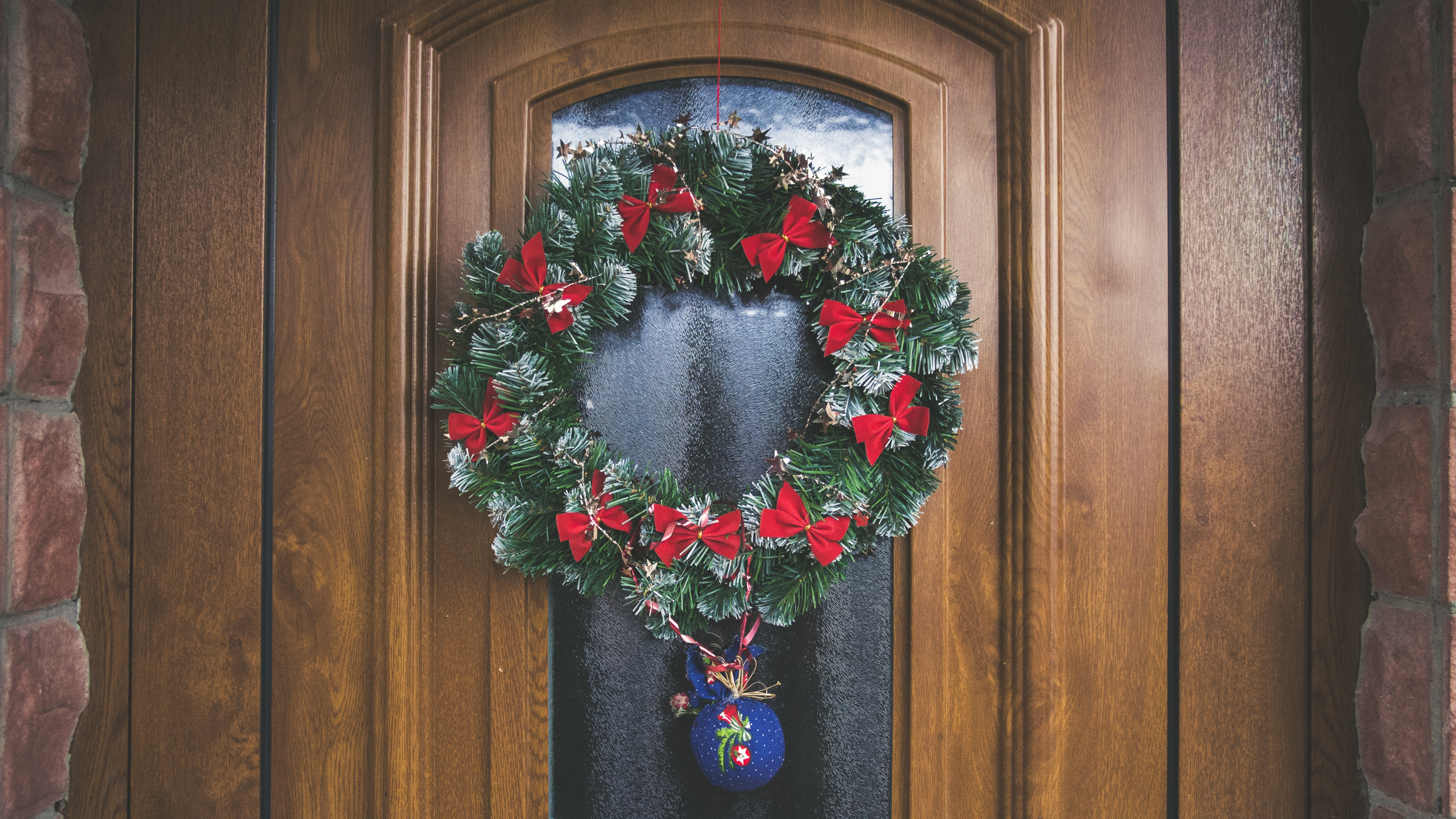 holiday wreath hanging on door