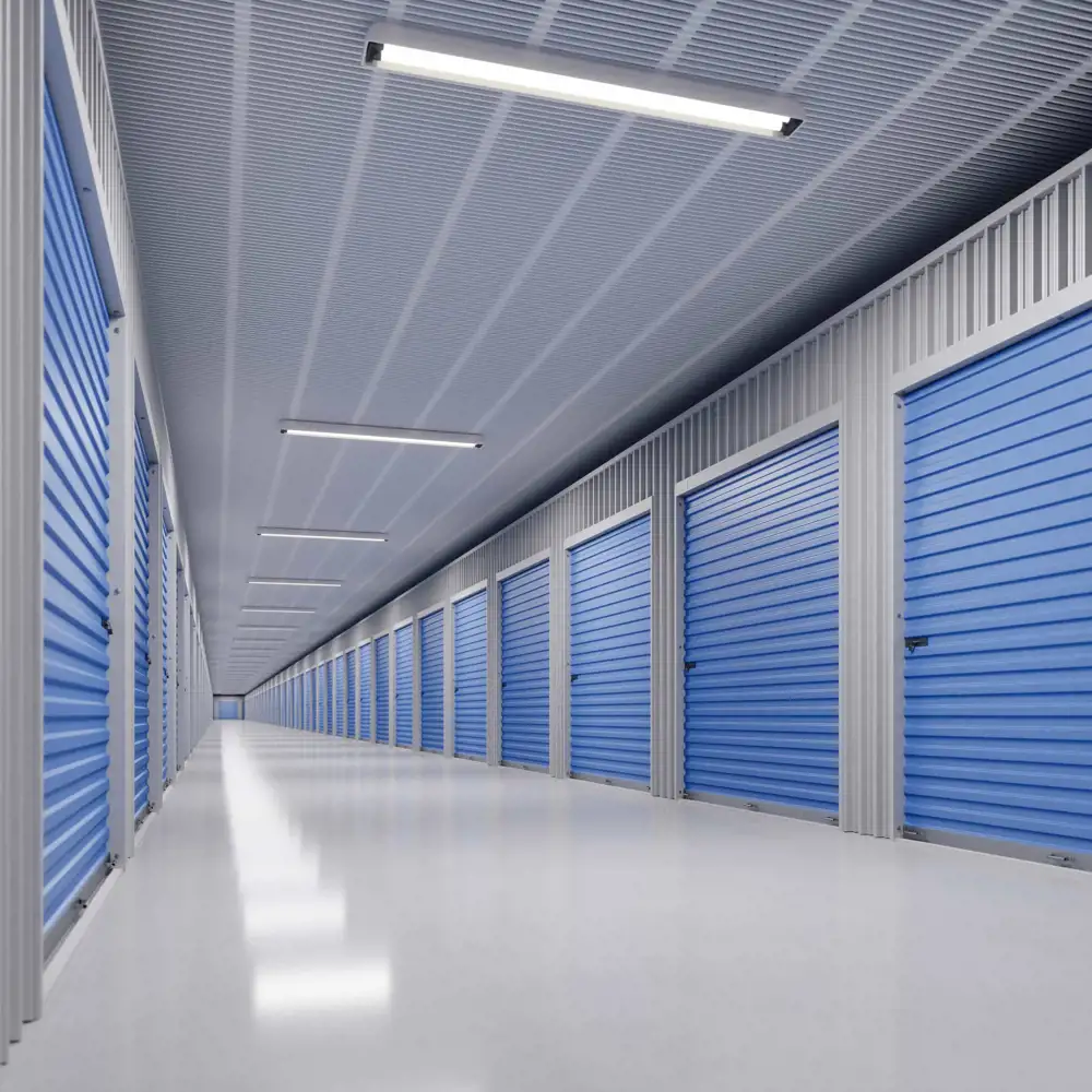 inside of storage facility hallway with blue storage unit doors