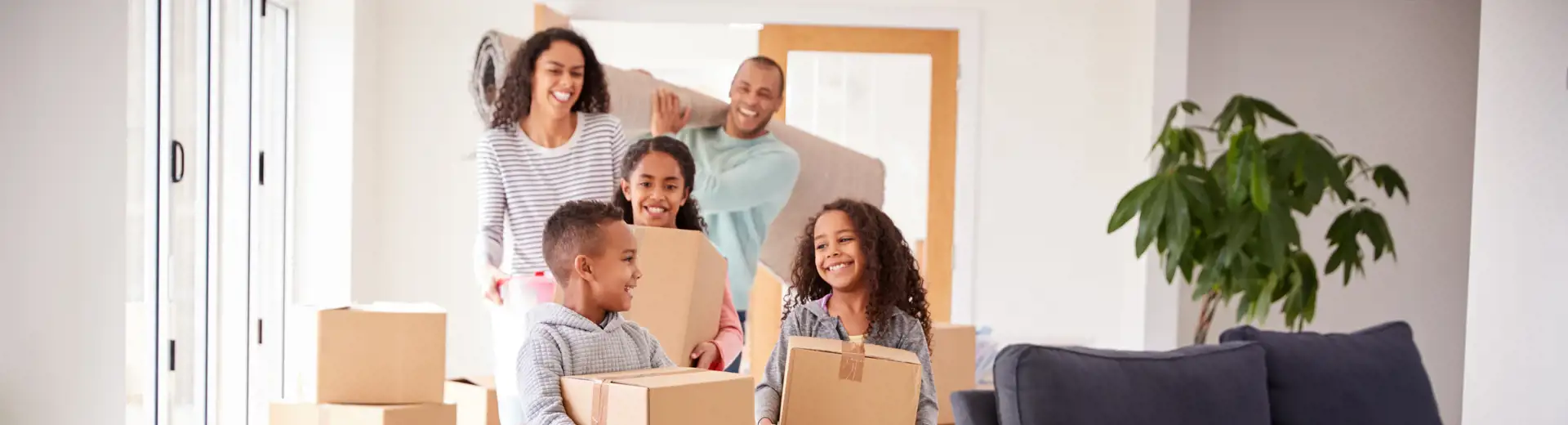 family with moving boxes