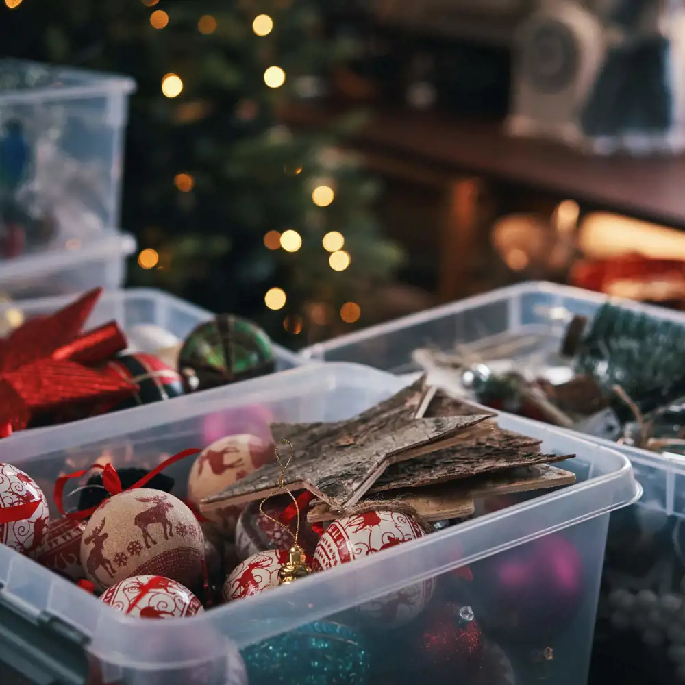 clear plastic bins with holiday ornaments