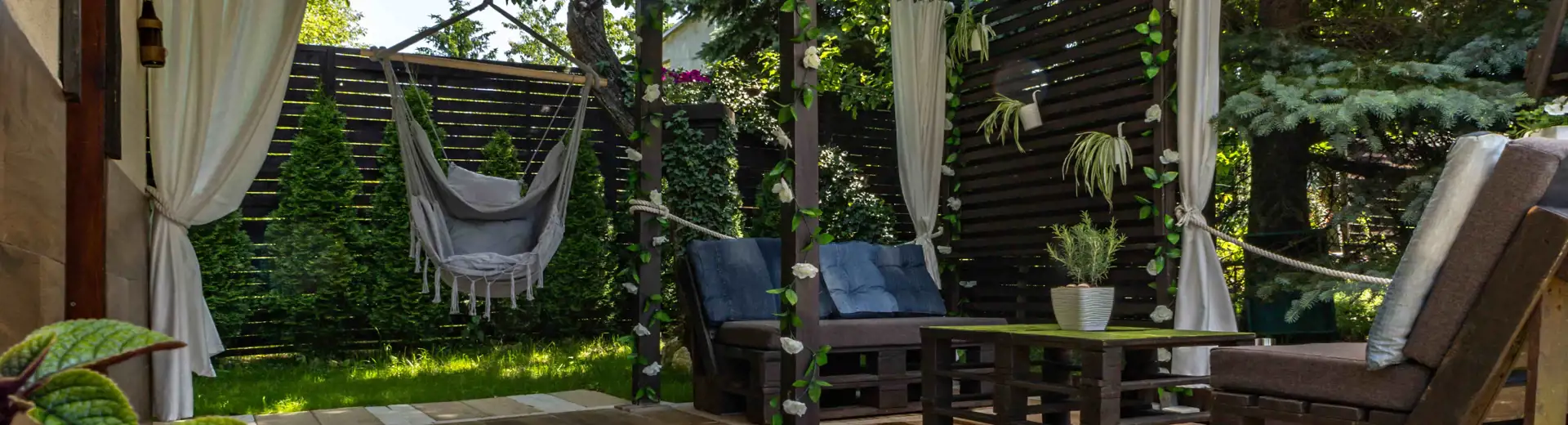 backyard oasis with plants and fences for privacy