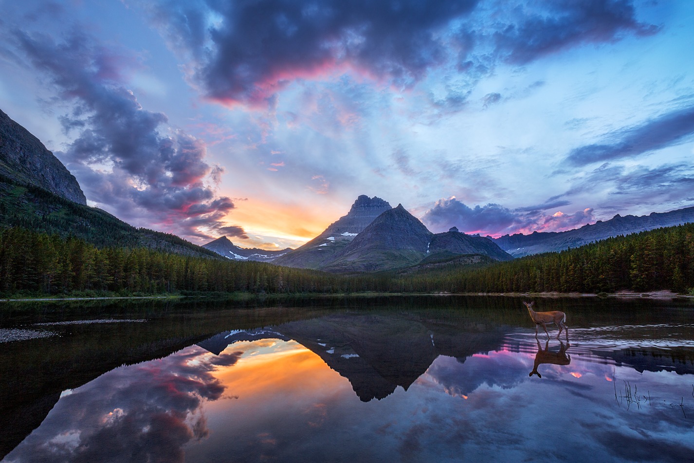 Image of lake and mountains of Glacier National Park in the evening