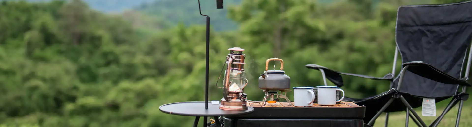 camping gear setup on hillside