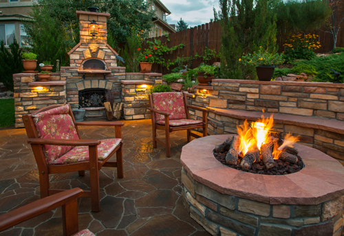 backyard with pizza oven and fire pit