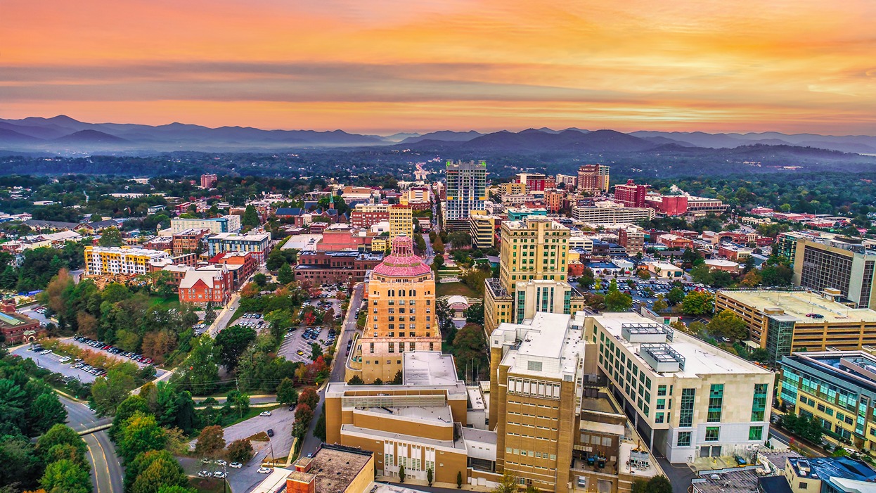 Asheville skyline with mountains in the distance. 