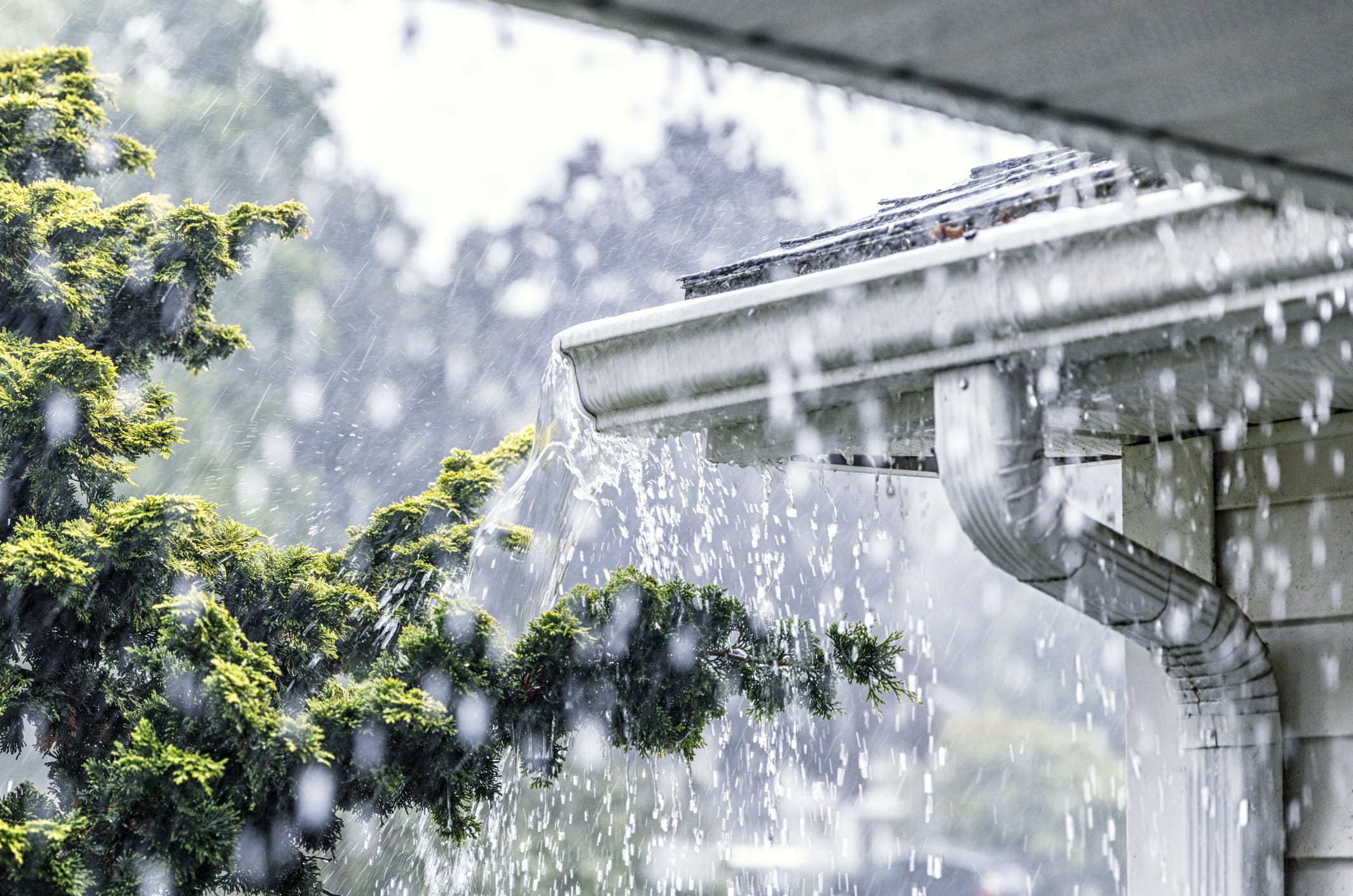 heavy rainfall on roof of home
