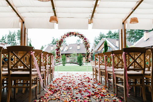 image of chairs under gazebo in backyard