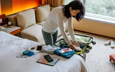 Person packing for an extended travle trip | SmartStop