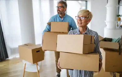 Elderly couple packing up household items to go to storage before they move to a smaller home | SmartStop