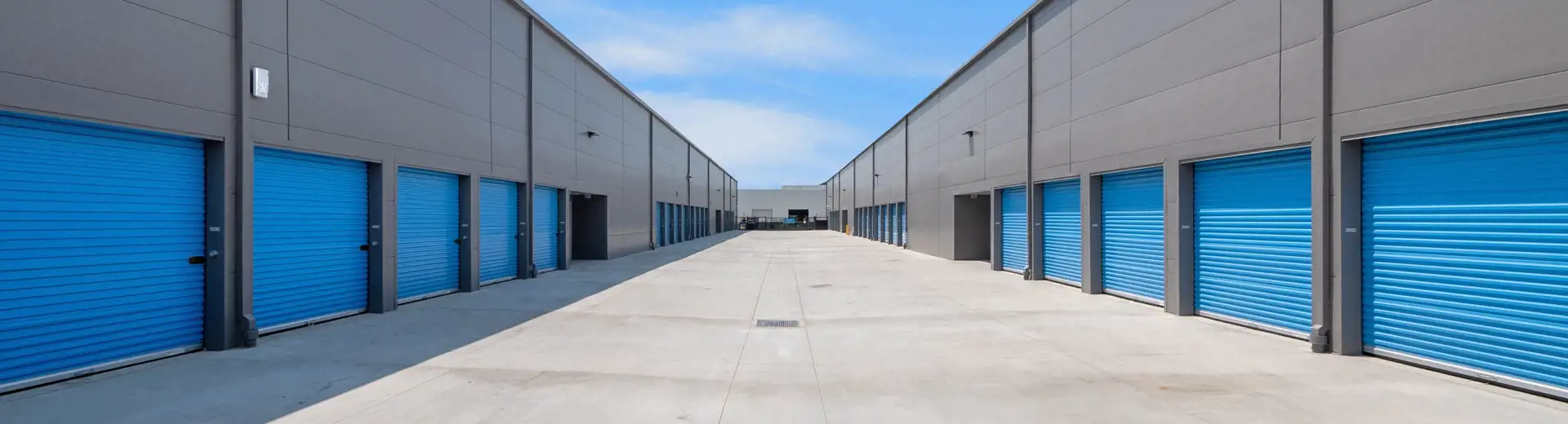 corridor of storage facilities with outdoor access