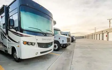 Image of uncovered parking spaces for car self storage, RV self storage and other vehicles self storage including motorhomes., large trucks and boats.