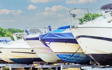 Image of boats in uncovered parking spaces at SmartStop